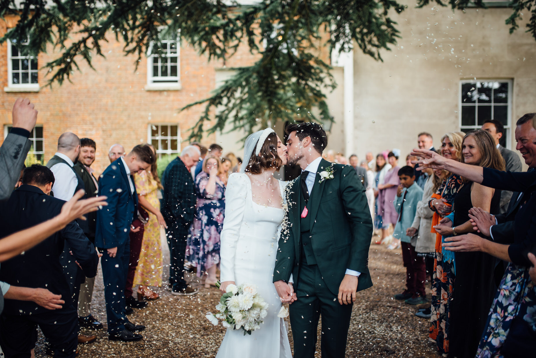 authentic wedding photography, Aswarby Rectory Wedding, michelle wood photographer, confetti kiss